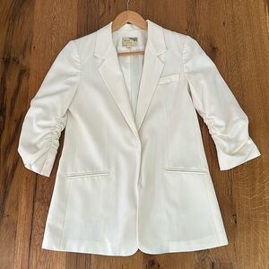 Elizabeth and James white blazer